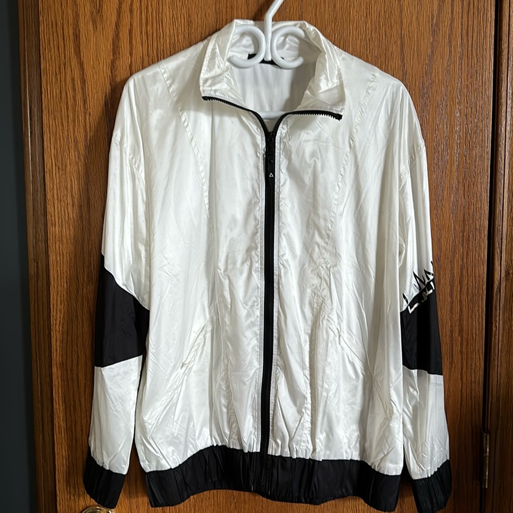 Lala Anthony white windbreaker jacket, size medium, never worn.